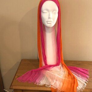 Joe Boxer striped ombre fringed scarf in shades of pink, cream, and orange